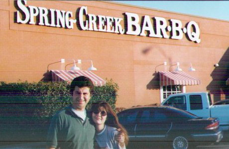 Banu and Alper in front of Spring Creek BBQ