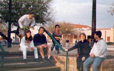 Banu and Mete Sitting on the Ladder in FortWorth