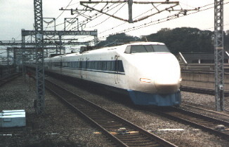 123-8 leads a train from Tokyo