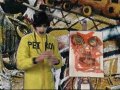 The Divine David painting a face