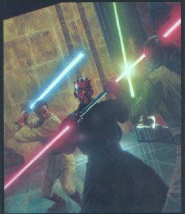 Darth Maul easily fends off two attackers with his devious weapon.