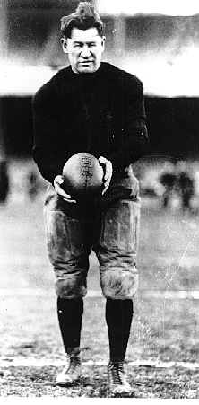 Jim Thorpe drop kicking a football!