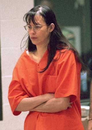 File--Andrea P. Yates is escorted from the court after being arraigned in Houston, Texas in this Friday, June 22, 2001 file photo. Jury selection was scheduled to begin Monday, Jan. 7, 2002, in the capital murder trial of Yates, who faces a possible death sentence if convicted of the June 20, 2001 drownings of three of her children _ Noah, 7, John, 5, and Mary, 6 months. Charges are pending for the drownings of Paul, 3, and Luke, 2. Yates has pleaded innocent by reason of insanity. (AP Photo/Steve Ueckert, Pool)