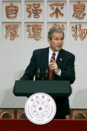 President Bush addresses students at Tsinghua University in Beijing, Friday, Feb. 22, 2002. (AP Photo/Greg Baker)